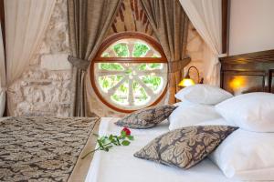 Krevet ili kreveti u jedinici u okviru objekta Heritage Boutique Hotel Adriatic-Adults only