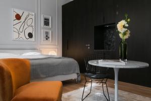 Voodi või voodid majutusasutuse Bumblebee Luxury Apartments toas