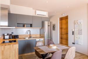 A kitchen or kitchenette at Sophia's Beach House