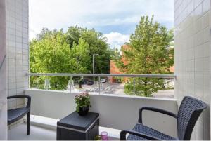 Un balcón o terraza en Old Market Apartment