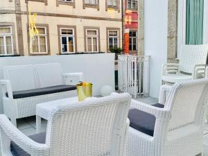 A seating area at The Arch - Charming Apartments in the Historic Center