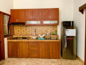 Una cocina o kitchenette en Villa Cabean Salatiga