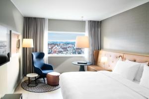 Gulta vai gultas numurā naktsmītnē Radisson Blu Atlantic Hotel, Stavanger