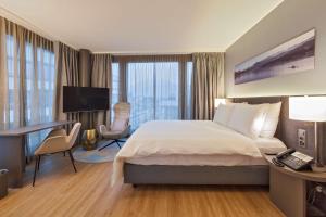 Cama ou camas em um quarto em Radisson Blu Hotel, Lucerne