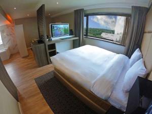 Riva hotel Den Haag - Delft 객실 침대