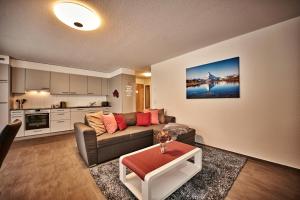 A cozinha ou cozinha compacta de Apartment Breithorn - Charming home - free parking & Wifi