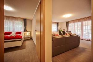 Cama ou camas em um quarto em Apartment Breithorn - Charming home - free parking & Wifi