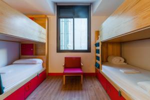 Кровать или кровати в номере Ok Hostel Madrid