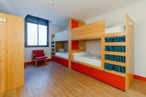 Кровать или кровати в номере Ok Hostel Madrid