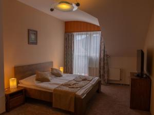 Cama ou camas em um quarto em Hotel Pizzeria Istria