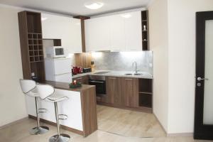 A cozinha ou cozinha compacta de Super Central Luxury Apartments