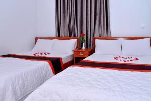 A bed or beds in a room at Sevensea Vung Tau