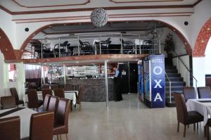 A restaurant or other place to eat at Hotel Oxa doo