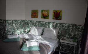 Ліжко або ліжка в номері Bed & Breakfast Hotel Zandvoort