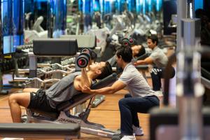 a group of men working out in a gym at The Sukhothai Bangkok in Bangkok