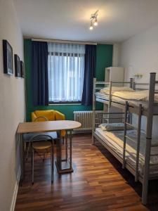 Vuode tai vuoteita majoituspaikassa Ruhrtropolis Hostel