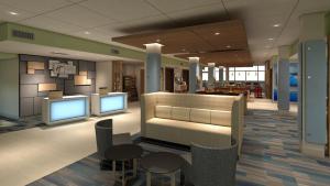 Uma área de estar em Holiday Inn Express & Suites - Orland Park Mokena, an IHG Hotel