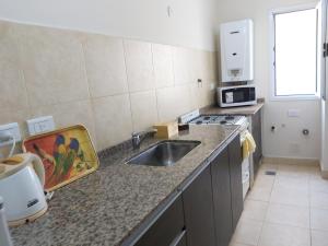 Majoituspaikan Amancay, hermoso departamento en Salta keittiö tai keittotila