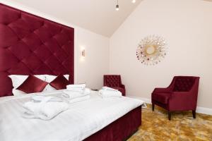 Voodi või voodid majutusasutuse Hotel Meltzer Apartments toas