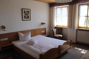 Кровать или кровати в номере Waldgasthof - Hotel Schiederhof