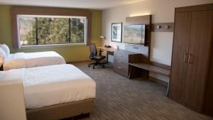 Lova arba lovos apgyvendinimo įstaigoje Holiday Inn Express & Suites Colorado Springs North by IHG