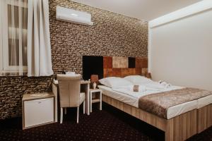 Voodi või voodid majutusasutuse Hotel & Spa Meydan toas