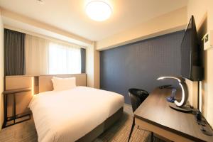 Richmond Hotel Yokohama Ekimae में टेलीविजन और/या मनोरंजन केंद्र