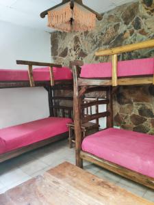 Posteľ alebo postele v izbe v ubytovaní Club Hostel Jujuy