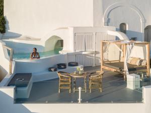 Uma área de estar em Cocoon Suites