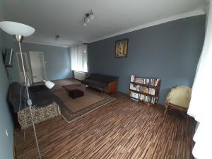 A bed or beds in a room at Hutasori Guesthouse