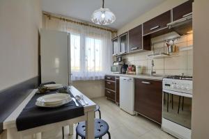 Кухня або міні-кухня у Apartament Dzień Dobry 3