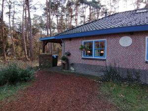 Ein Garten an der Unterkunft Holiday home bos en heide