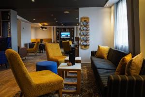 منطقة جلوس في Holiday Inn Ellesmere Port/Cheshire Oaks, an IHG Hotel