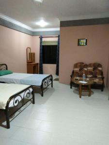 Mulu Diana Homestay में एक कमरे में एक या कई बेड