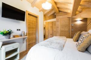 Cama ou camas em um quarto em Chalet sur les monts Morzine