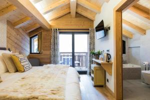 Cama ou camas em um quarto em Chalet sur les monts Morzine