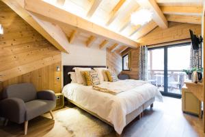 Cama ou camas em um quarto em Chalet sur les monts Morzine