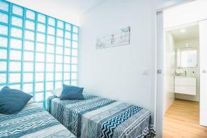 Cama ou camas em um quarto em Ampuries Delta Apartment