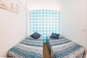 Cama ou camas em um quarto em Ampuries Delta Apartment