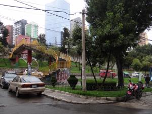 a car parked on a street next to a playground at Hostal Bivouac in La Paz