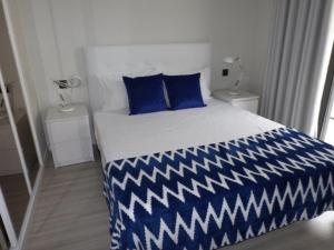 Duque de Loulé - Apartments - Apartamento F tesisinde bir odada yatak veya yataklar