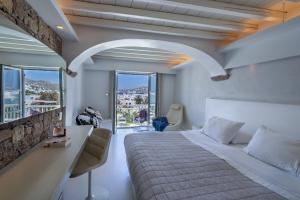 Semeli Hotel Mykonos में एक कमरे में एक या कई बेड