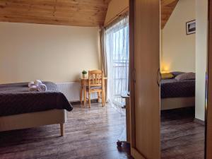 Lova arba lovos apgyvendinimo įstaigoje Guest House Kamara