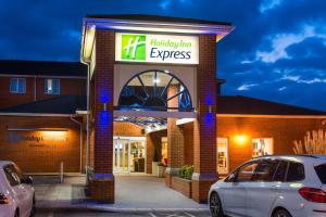 a building with a sign that reads holiday inn express at Holiday Inn Express Southampton West, an IHG Hotel in Southampton