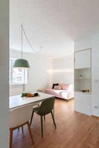 A bed or beds in a room at Hus Appartement - Nr. 3