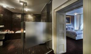 Кровать или кровати в номере Boutique Hotel Chrysso