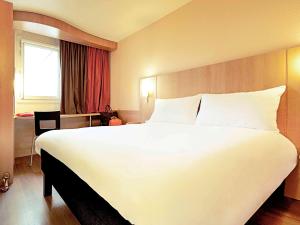 Hotel ibis Braga 객실 침대