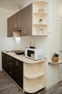 A cozinha ou kitchenette de Apartments at Kontorska 10