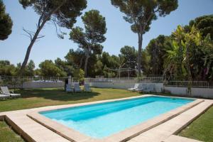 The swimming pool at or close to Gemelos