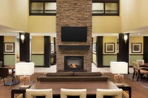 A seating area at Staybridge Suites West Edmonton, an IHG Hotel